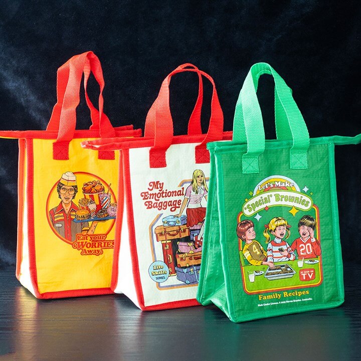 Eat Your Worries Lunch Bag by Steven Rhodes — insulated lunch bags with retro cartoon prints in yellow, white and green