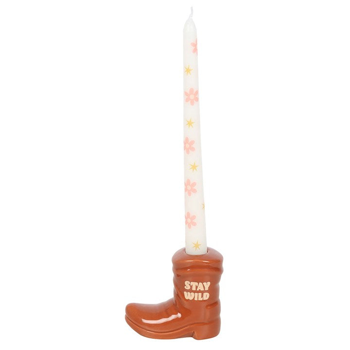 Brown Cowboy Boot Candle Holder with Taper Candle adds Western charm, featuring a floral taper in a classic boot design.