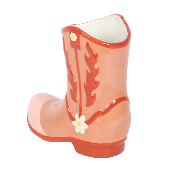 Bright pink cowboy boot flower vase, perfect for adding a whimsical touch to any cowgirl’s decor. Ideal accent piece!
