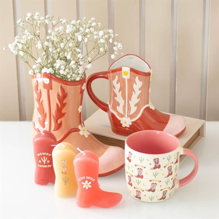 Add a touch of charm to your decor with the Pink Cowboy Boot Flower Vase, perfect for any cowgirl's space.