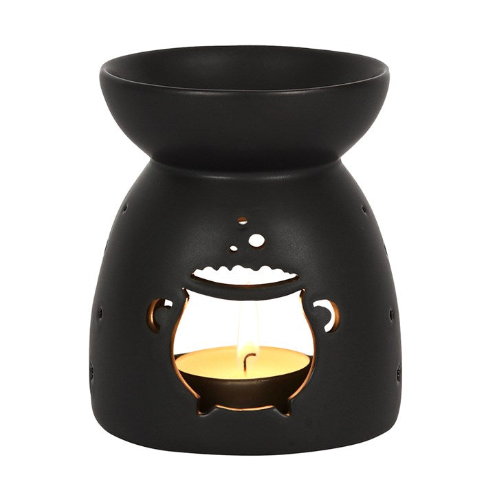 Black Cauldron Cut Out Oil Burner in matte black ceramic, for fragrance oil or wax, candle glow.