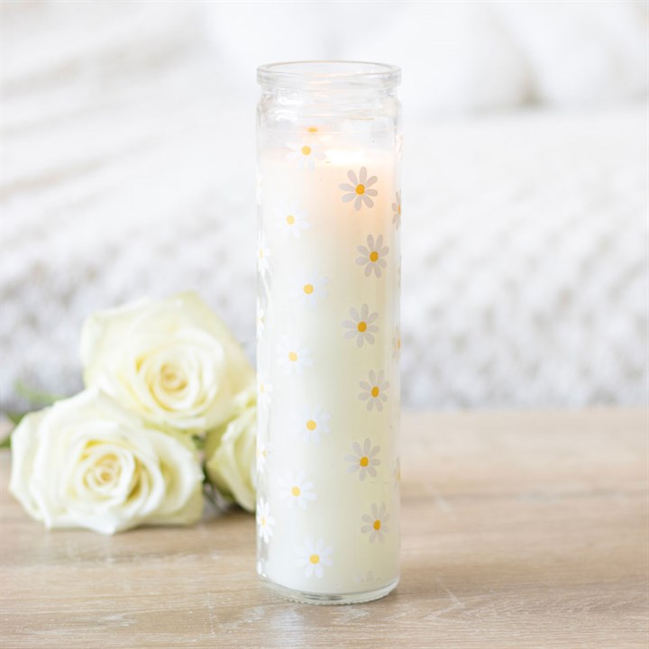 White Daisy Tube Candle in a reusable glass jar with a daisy pattern and spring floral scent on a wooden table.