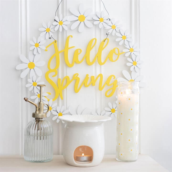 White Daisy Tube Candle in a reusable glass jar with spring floral scent, 70-hour burn time.