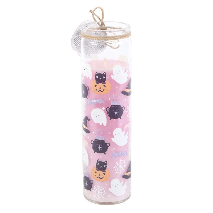 Pastel Halloween Candy Apple Tube Candle in a clear glass tube with black cats, ghosts and pumpkins, tied with twine.