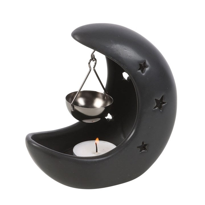 Black Crescent Moon Hanging Oil Burner with star-cutout design, suspended metal bowl and lit tealight candle.