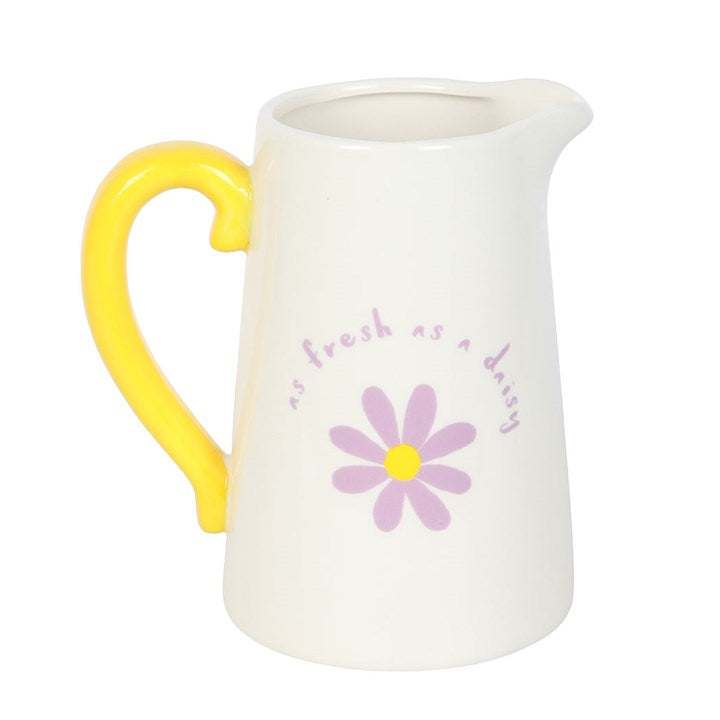 Brighten your home with the Fresh as a Daisy Ceramic Flower Jug, featuring a charming purple and yellow design.