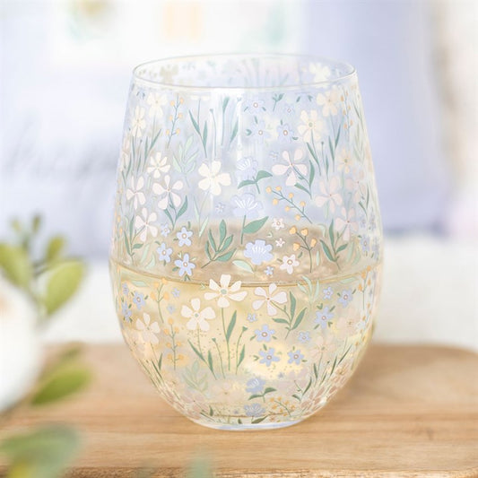 Enjoy your drink in style with the Ditsy Floral Print Stemless Glass, featuring a delicate purple floral design.