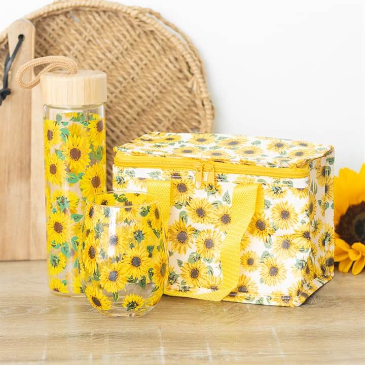 Brighten your day with the Sunflower Print Stemless Glass, featuring a cheerful all-over sunflower design.