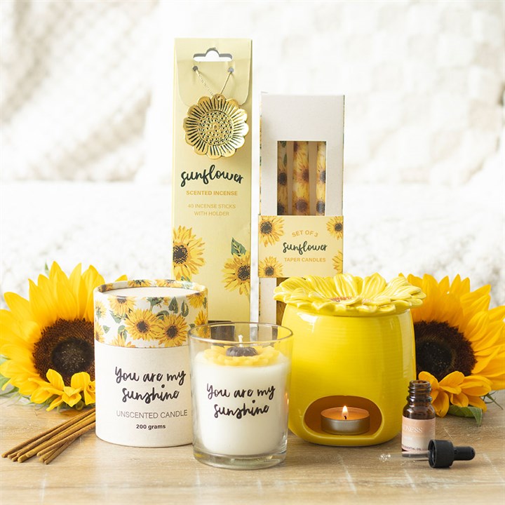 Brighten your home with the Set of 3 Sunflower Taper Candles, perfect for summer table settings and cheerful decor.