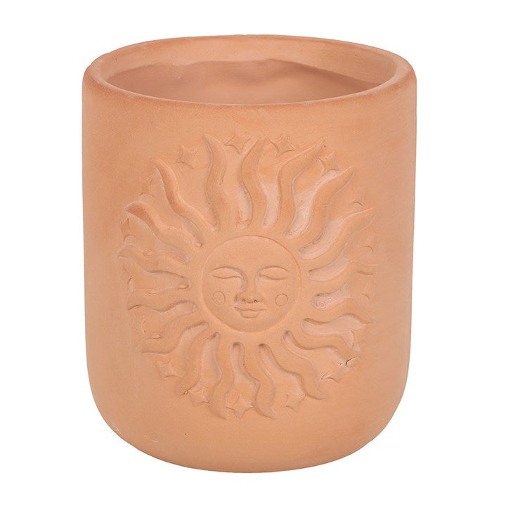 Stylish Terracotta Sun Plant Pot with embossed sun design, perfect for showcasing your favourite plants.