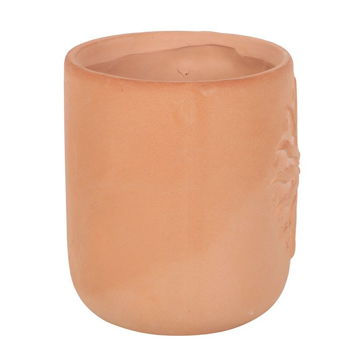 Terracotta Sun Plant Pot with embossed sun design, perfect for adding bohemian style to any decor.