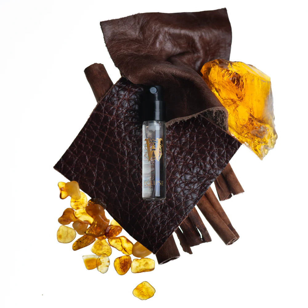 Saltworks Eclipse fragrance bottle with leather, amber and cinnamon sticks; unisex oriental scent.