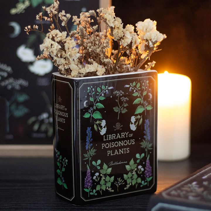 Dark elegance meets functionality with the Poisonous Plants Book Shaped Vase, perfect for floral displays.