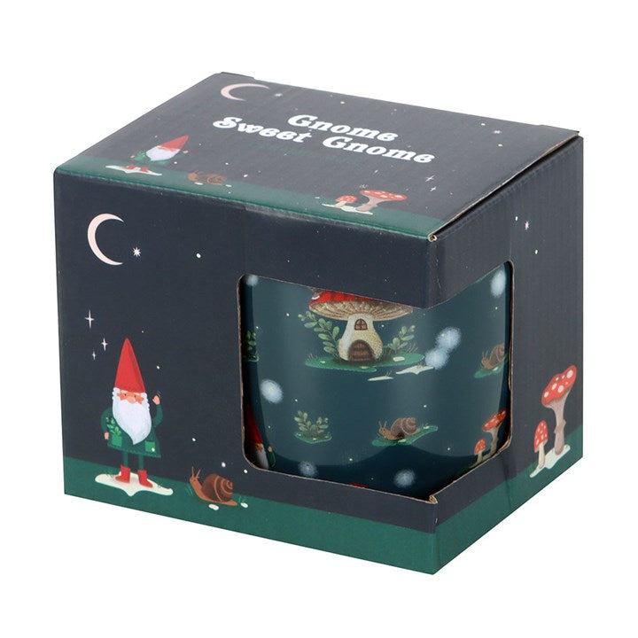 Gnome Sweet Gnome Print Mug in a charming box, showcasing whimsical gnomes and mushroom houses for a magical morning.