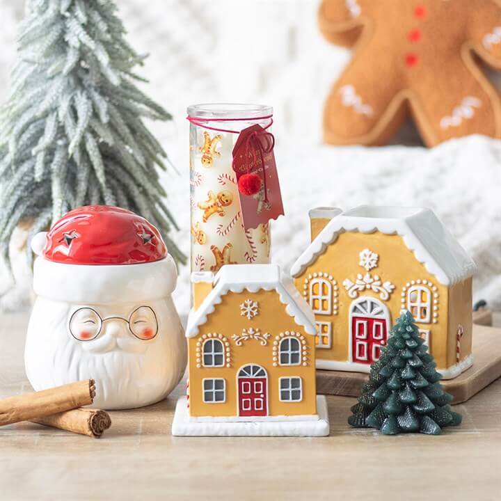Create a festive ambiance with the Candy Cane Gingerbread House Oil Burner and Wax Warmer, perfect for cosy settings.