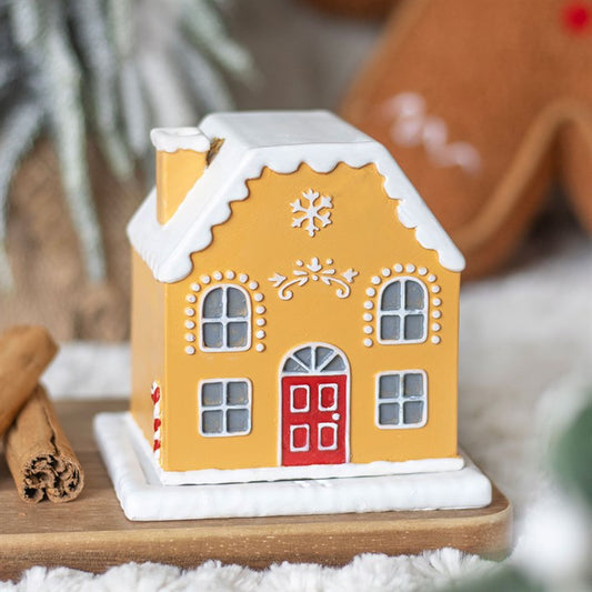 Enhance your festive decor with the Candy Cane Gingerbread House Incense Cone Holder, perfect for a cosy atmosphere.