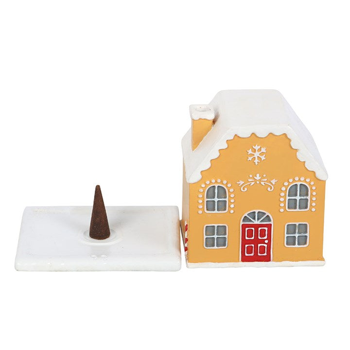 Add festive charm to your home with the Candy Cane Gingerbread House Incense Cone Holder, perfect for seasonal décor.