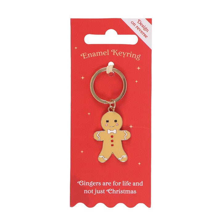Gingerbread Man Keyring - festive enamel charm on red card, perfect for keys or bags.