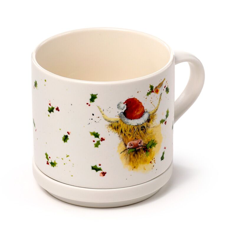 Porcelain mug and coaster lid set featuring Christmas Highland Coo by Jan Pashley with holly motif.