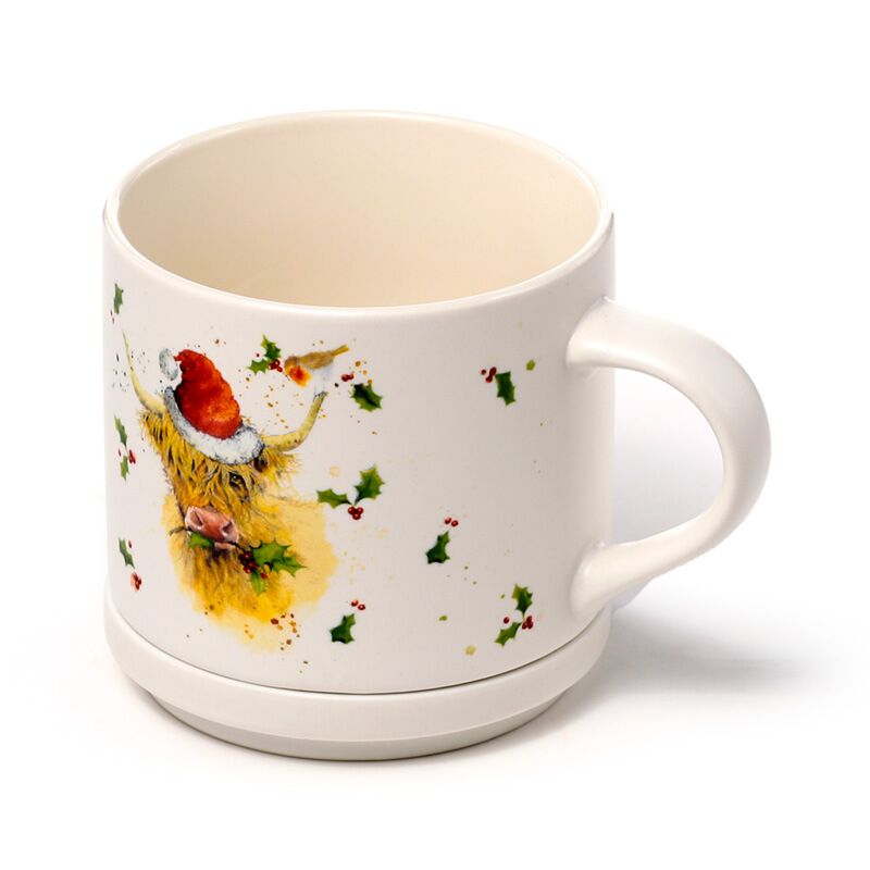 Porcelain mug and coaster lid set featuring a Christmas Highland Coo illustration by Jan Pashley.