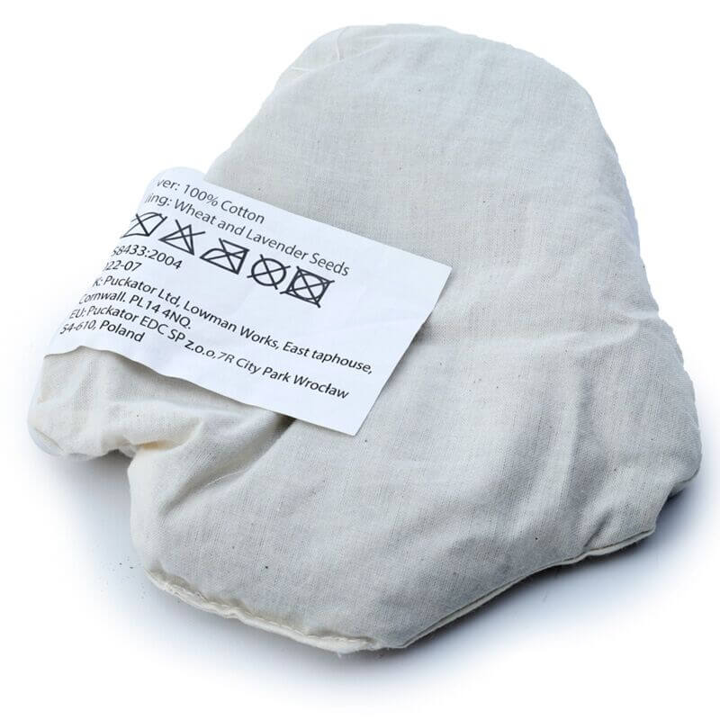 Microwavable plush lavender heat pack Penguin, cream fabric with care label visible.