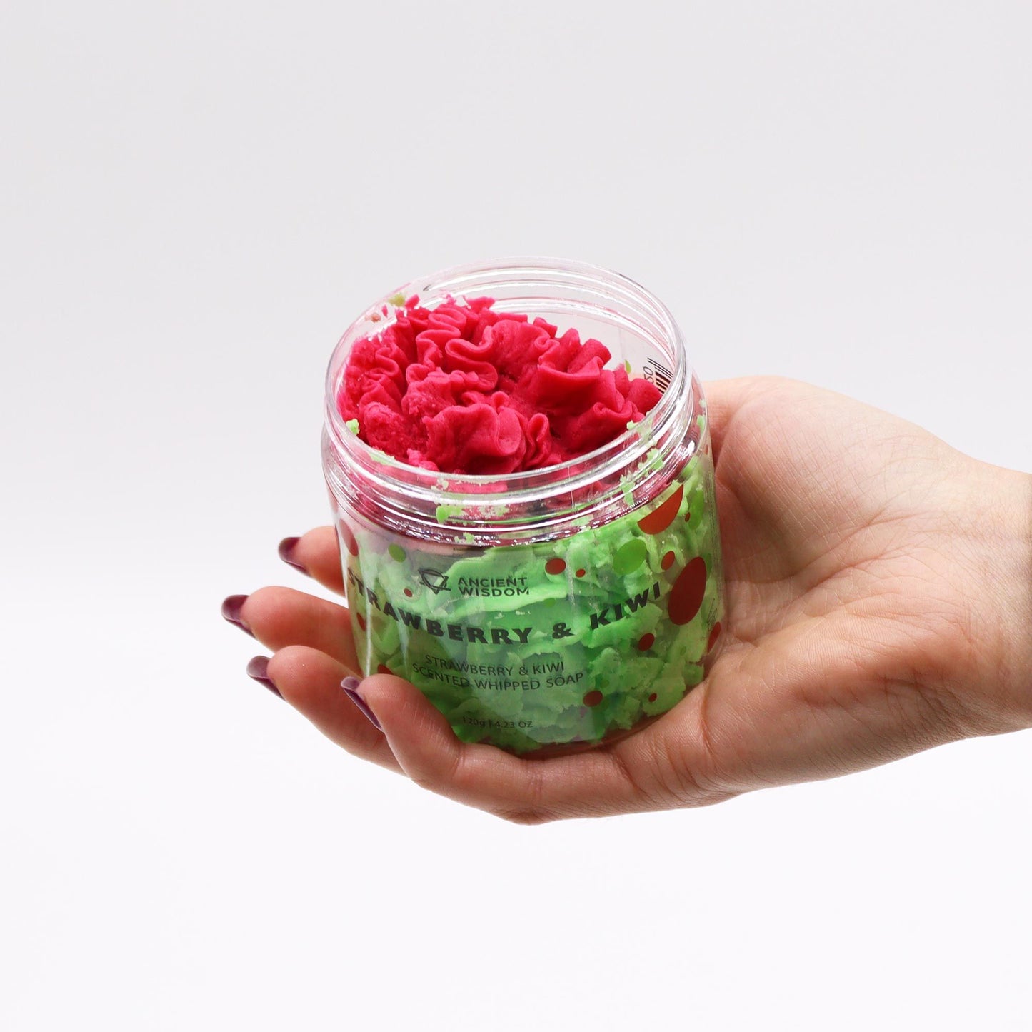 Ancient Wisdom Strawberry & Kiwi whipped soap 120g in a clear jar with pink whipped top and green shreds.
