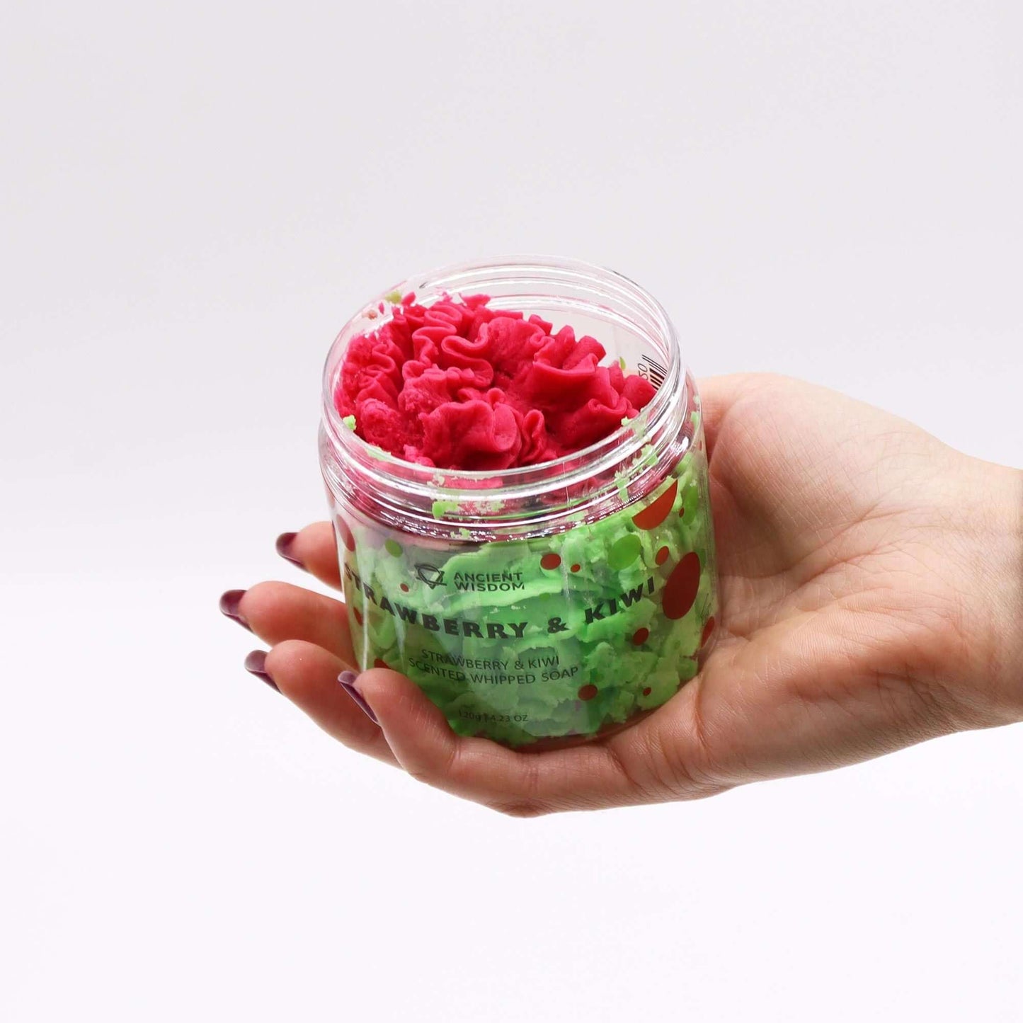 Ancient Wisdom Strawberry & Kiwi whipped soap 120g in a clear jar with pink whipped top and green shreds.