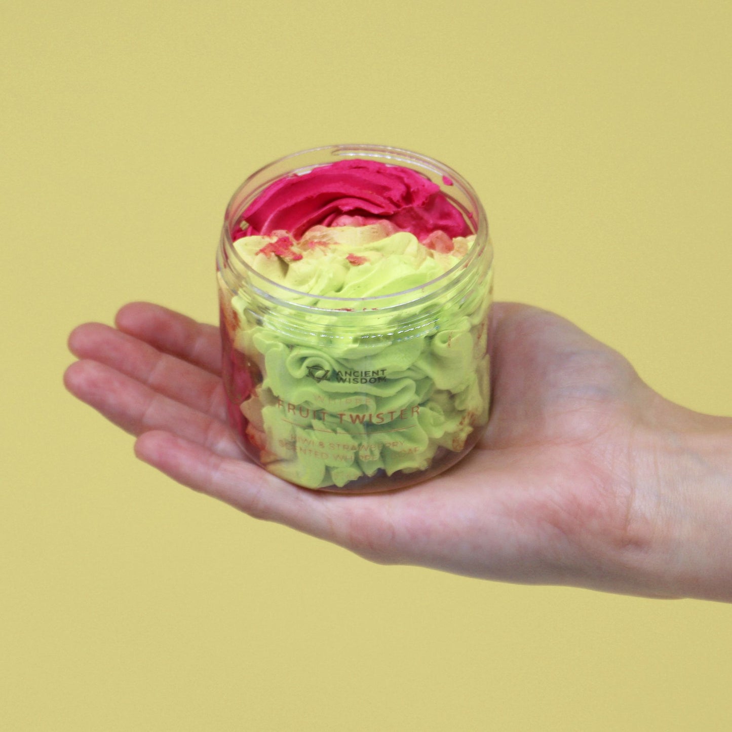 Strawberry & Kiwi Whipped Soap 120g, Fruit Twister by Ancient Wisdom in a jar held in hand