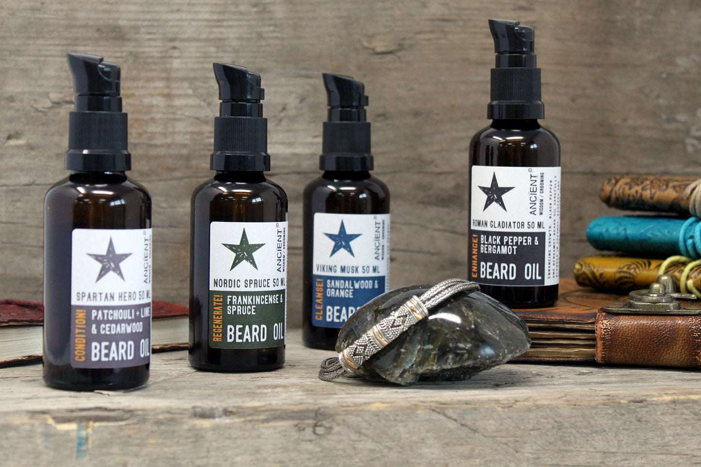 50ml Nordic Spruce beard oil bottle among other beard oils on a rustic wooden surface
