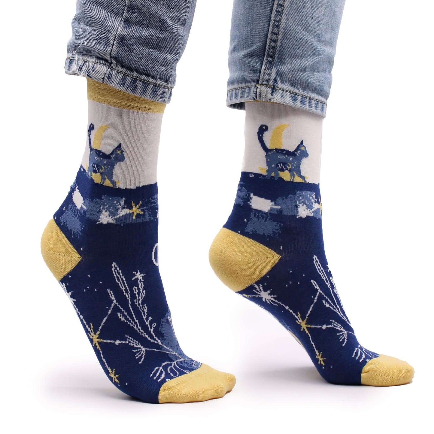 Hop Hare Bamboo Socks S/M - Midnight Cat worn by person, showcasing vibrant midnight cat design and colorful accents.