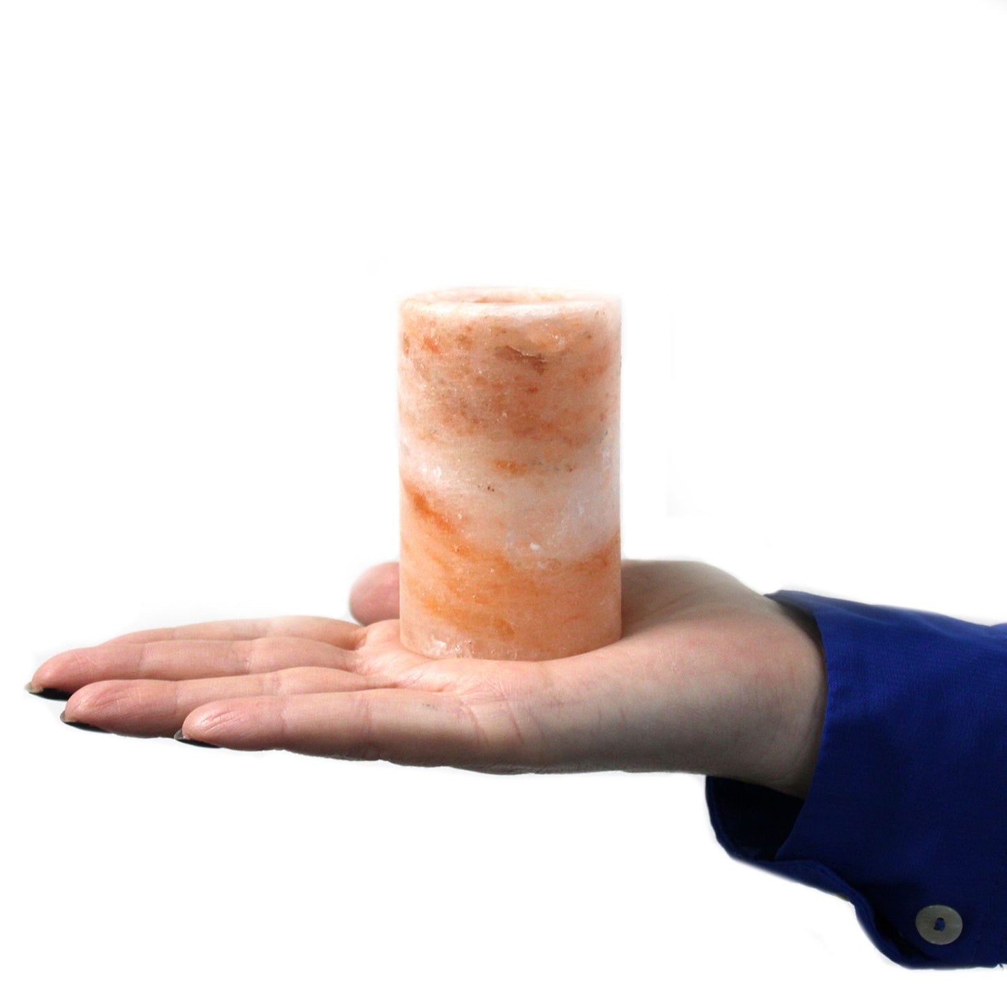 Set of 2 Himalayan Salt Shot Glasses on a palm, pink salt block display.