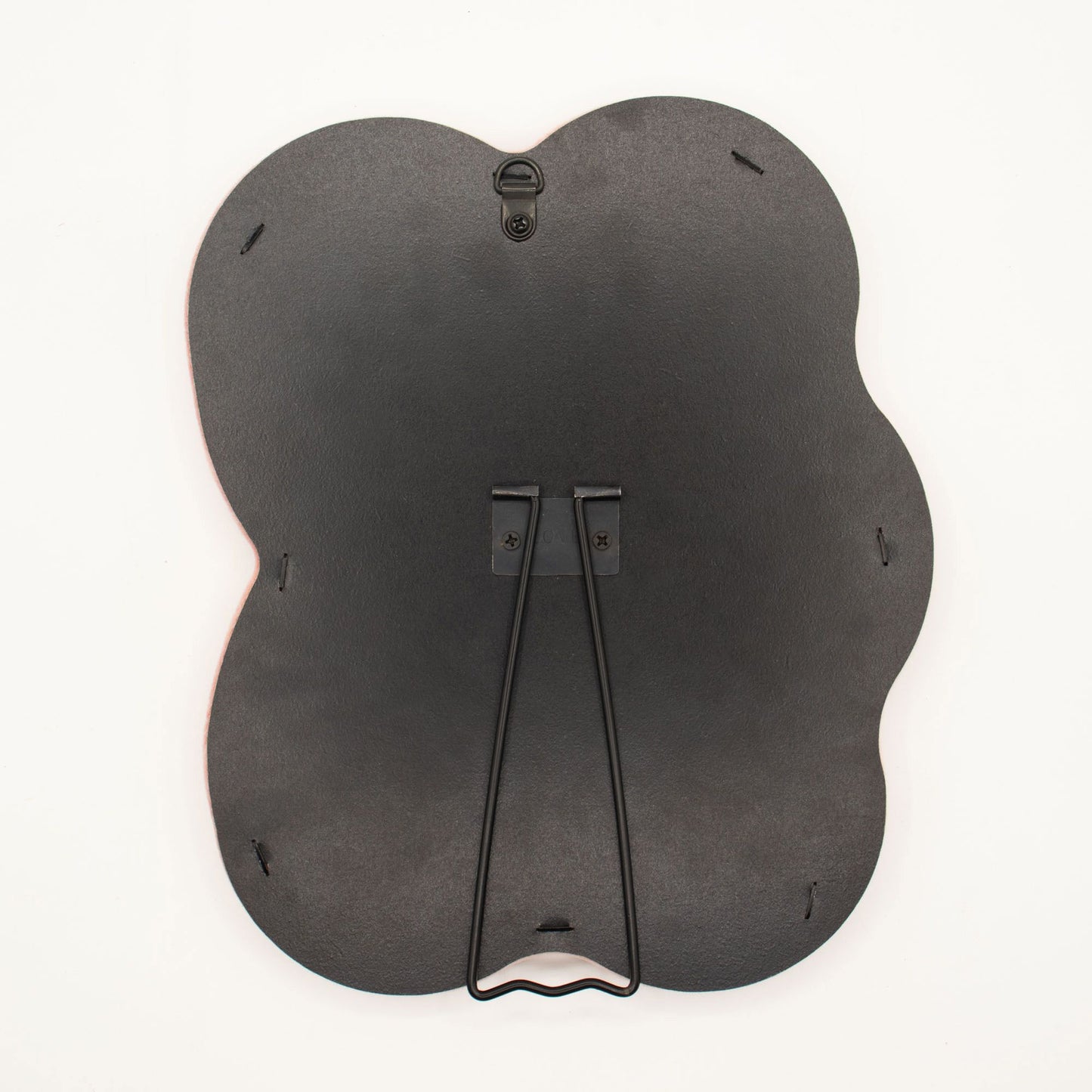 Black butterfly-shaped product on a white background