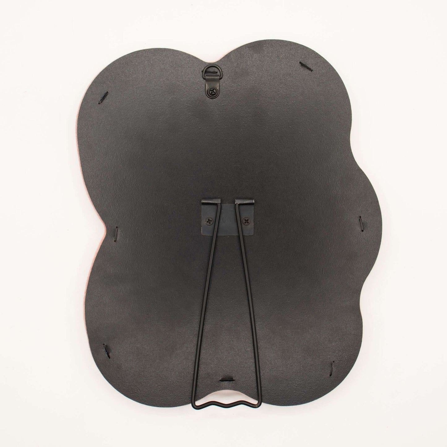 Black butterfly-shaped product on a white background