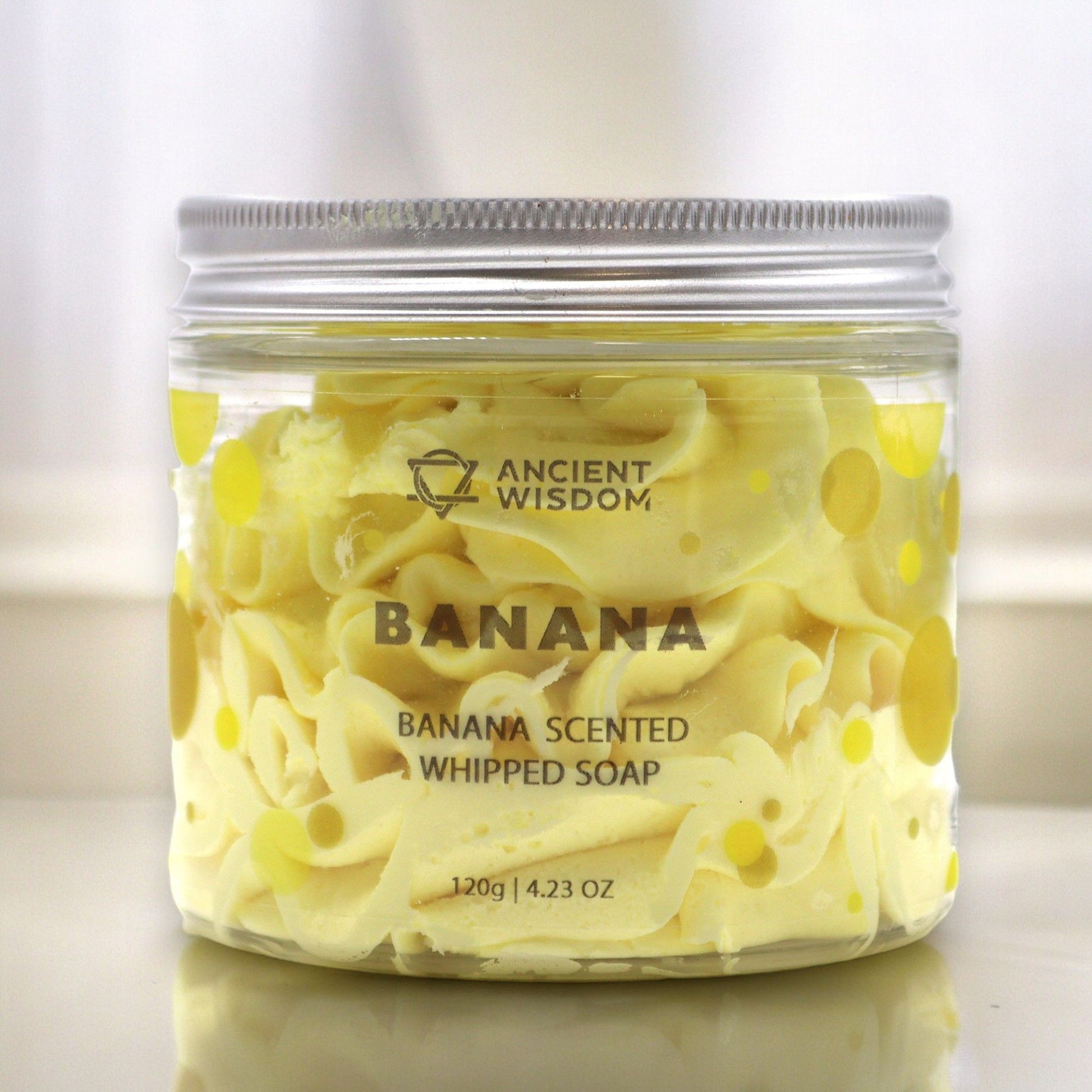 Banana Whipped Soap 120g, banana scented, in a clear jar with yellow polka dots, Ancient Wisdom.