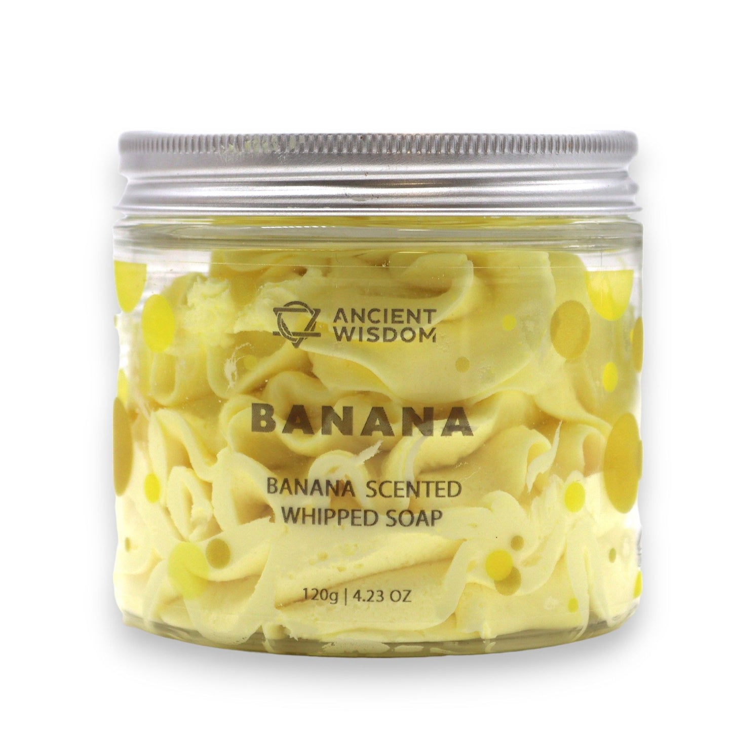Ancient Wisdom banana scented whipped soap in a clear jar with a silver lid, 120 g.