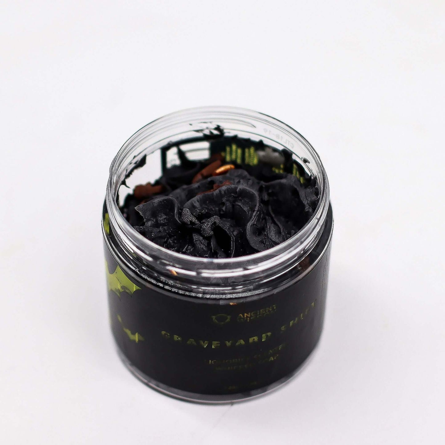 Graveyard Shift Whipped Soap 120g in a glass jar with dark black whipped soap.