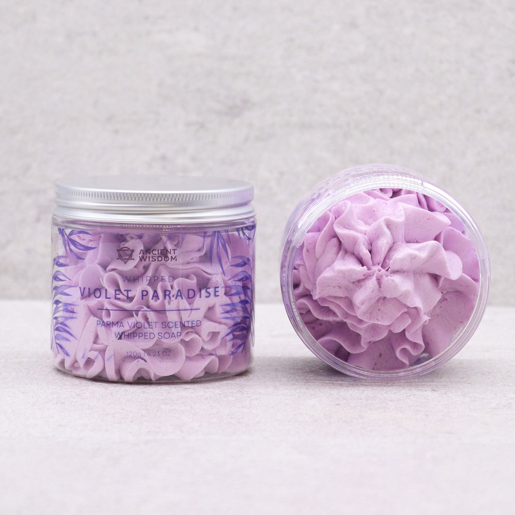 Parma Violet Whipped Soap 120g in a clear jar with purple swirls, Violet Paradise scented.