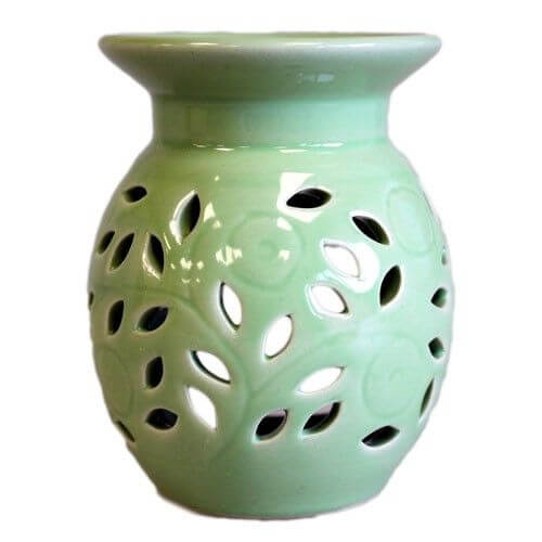 Floral Oil Burner - Lime: lime green ceramic aromatherapy oil burner with botanical leaf cutout design.