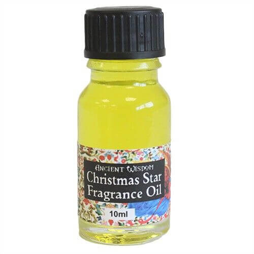 Christmas Star Fragrance Oil 10ml Festive Elegant Holiday Scent in a glass bottle with colorful label.