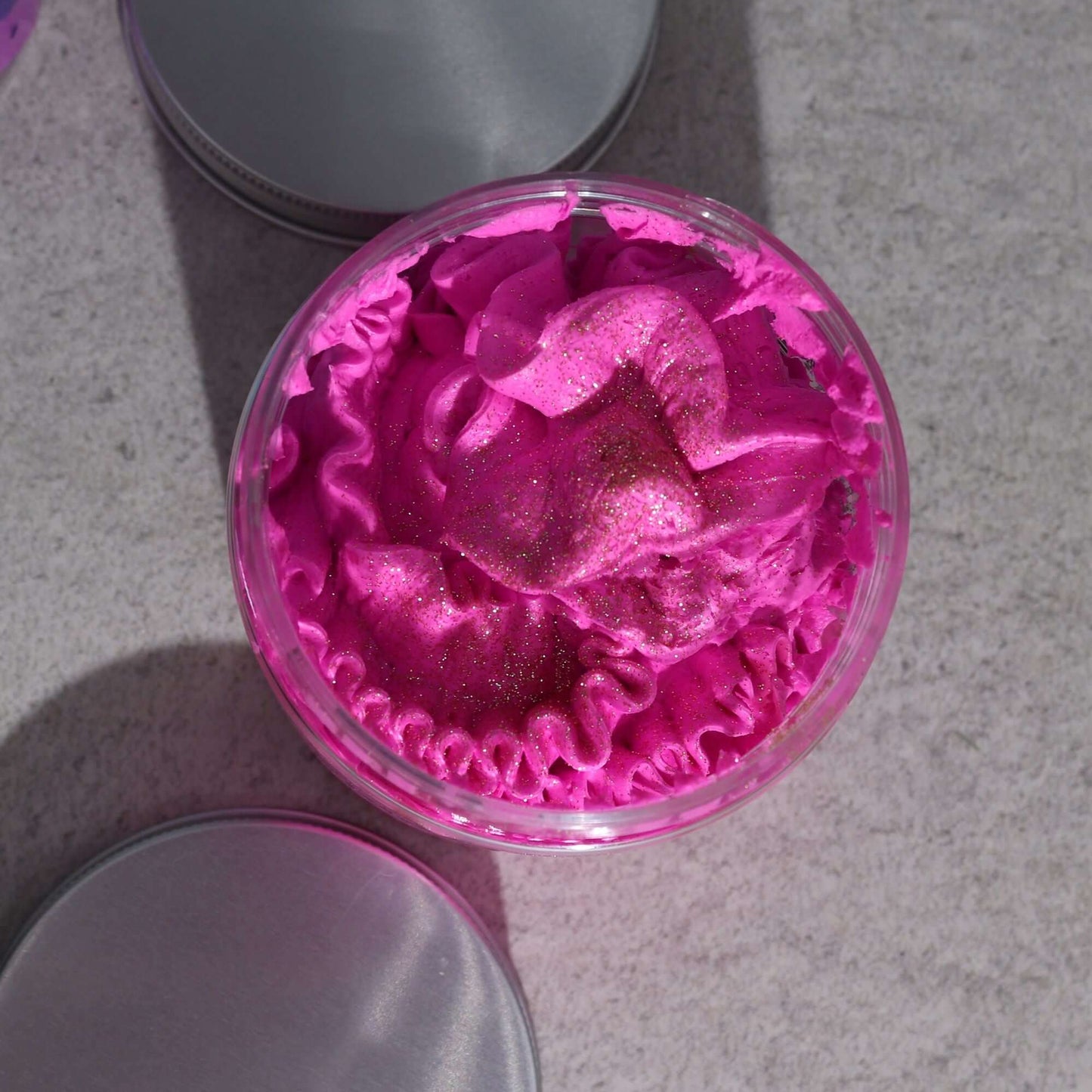 Pink Charlotte Whipped Cream Soap 120g in a clear jar, with vibrant pink ruffled whipped soap and gold glitter.
