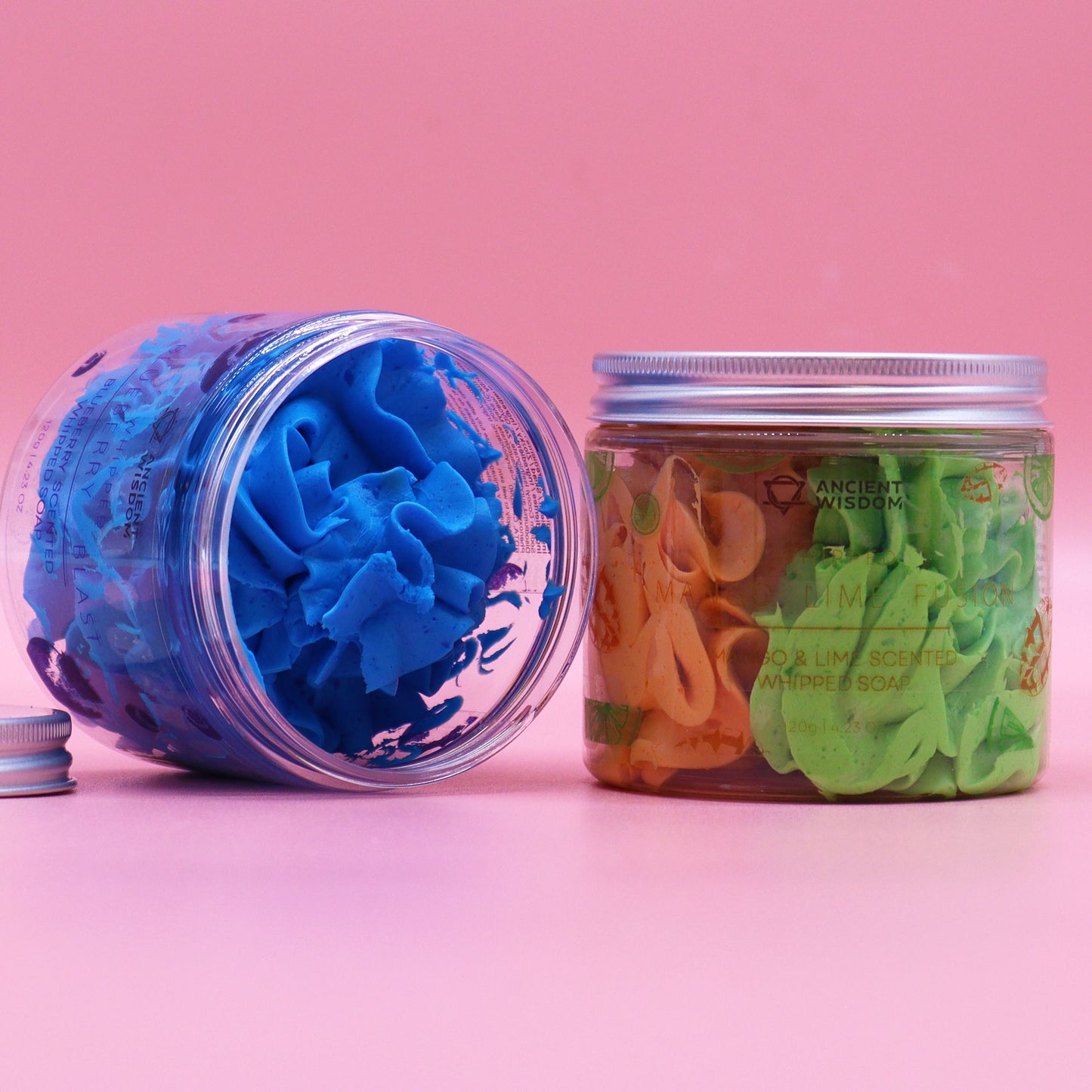 Two jars of Mango & Lime Whipped Soap 120g; open blue whipped soap beside a sealed mango-lime jar.