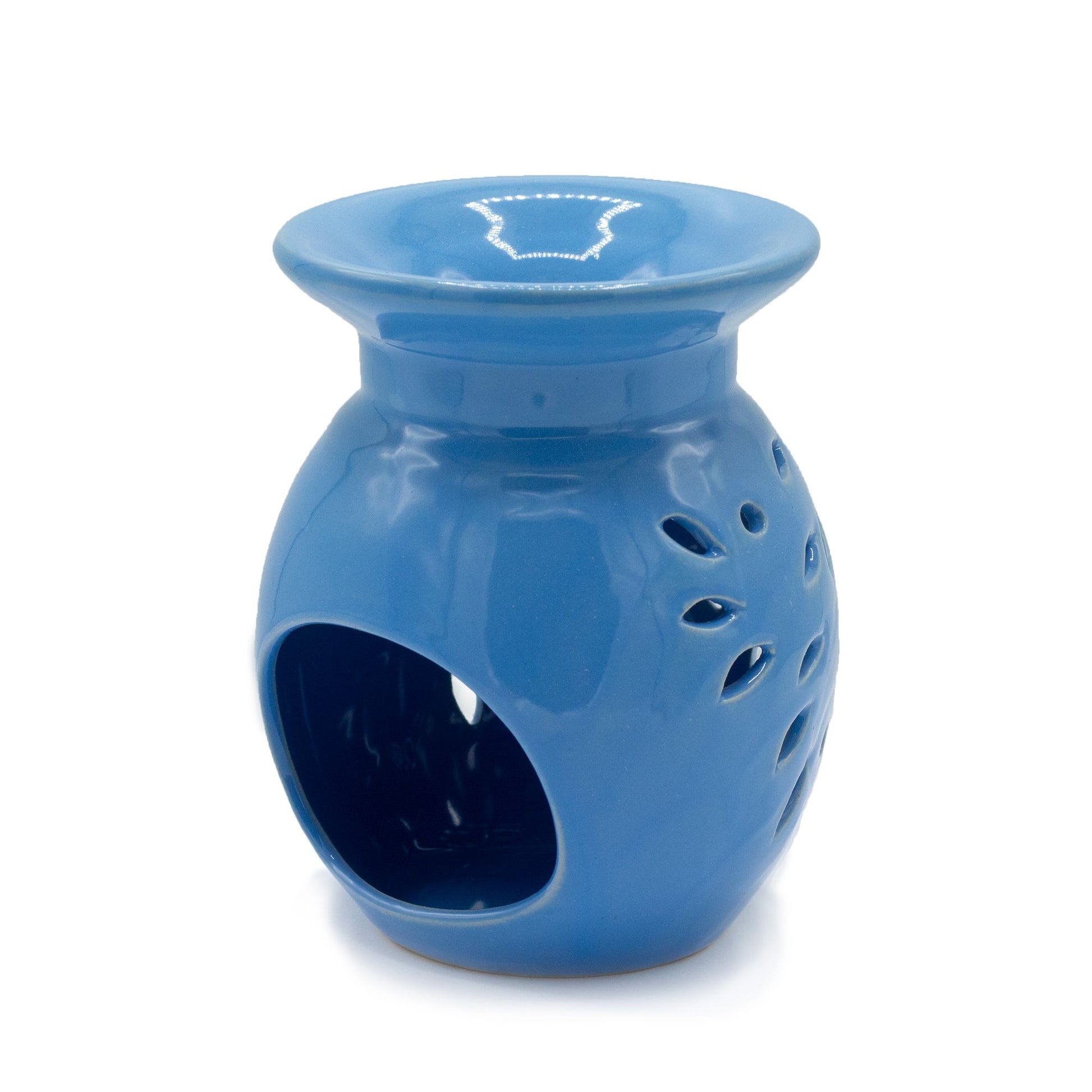 Floral Oil Burner - Blue ceramic aromatherapy burner with floral cutouts and ocean blue glaze