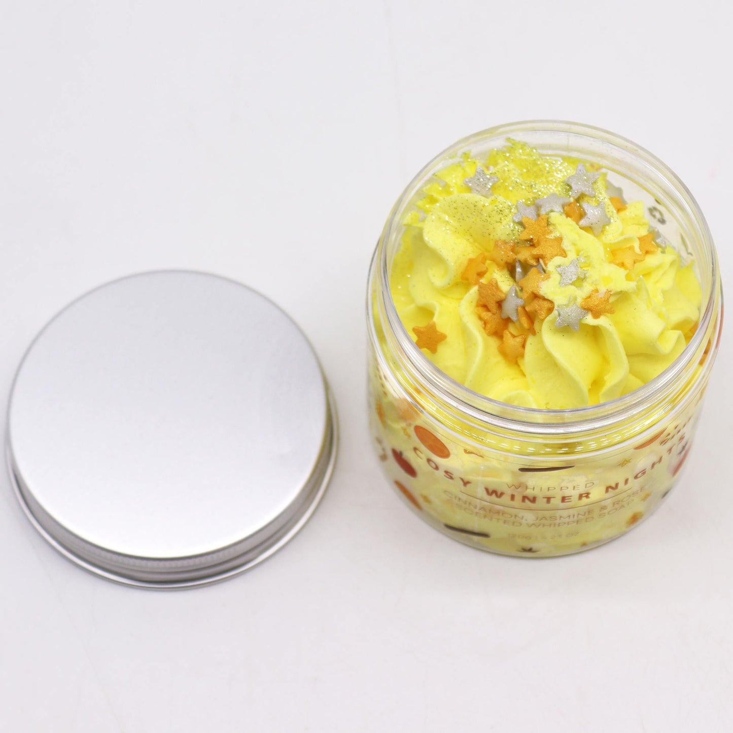 Cosy Winter Nights Whipped Soap 120g - bright yellow whipped soap in a clear jar with star sprinkles