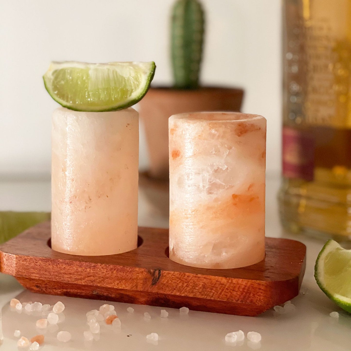 Set of 4 Himalayan Salt Shot Glasses on a wood serving stand – premium gift set