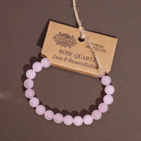 Rose Quartz Power Bracelet - a lovely accessory that promotes love and determination, perfect for any outfit.