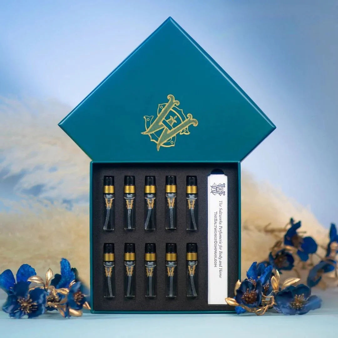 Discovery Set from Saltworks: teal presentation box opened to reveal ten 2ml fragrance vials and a guide card.