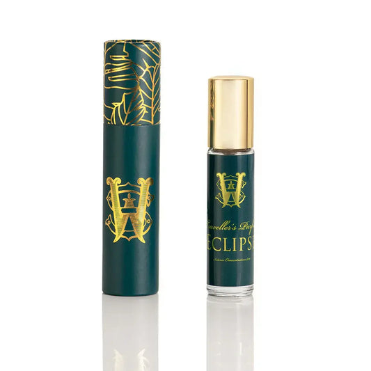Saltworks Eclipse fragrance bottle with gold cap beside teal packaging, unisex oriental blend.