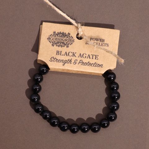 Stylish Power Bracelet - Black Agate showcasing strength and protection, perfect for any outfit.