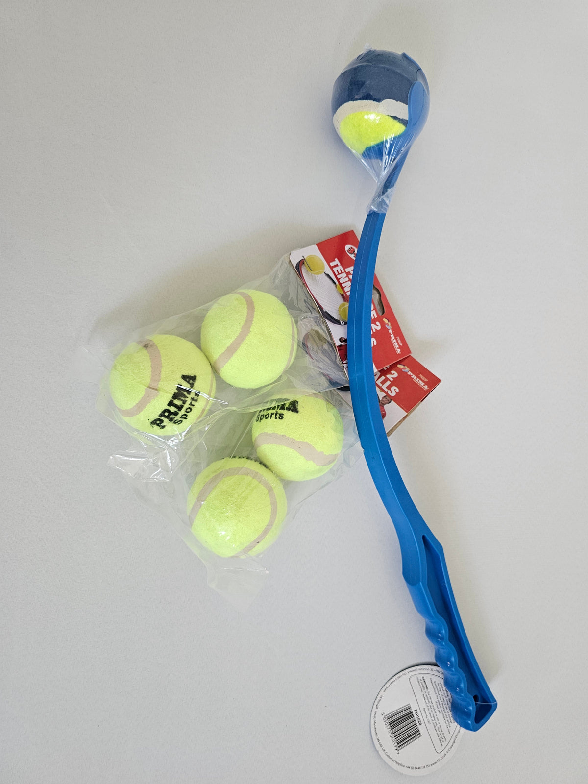 Blue dog tennis ball launcher with three refill balls in clear packaging for extended fetch sessions.