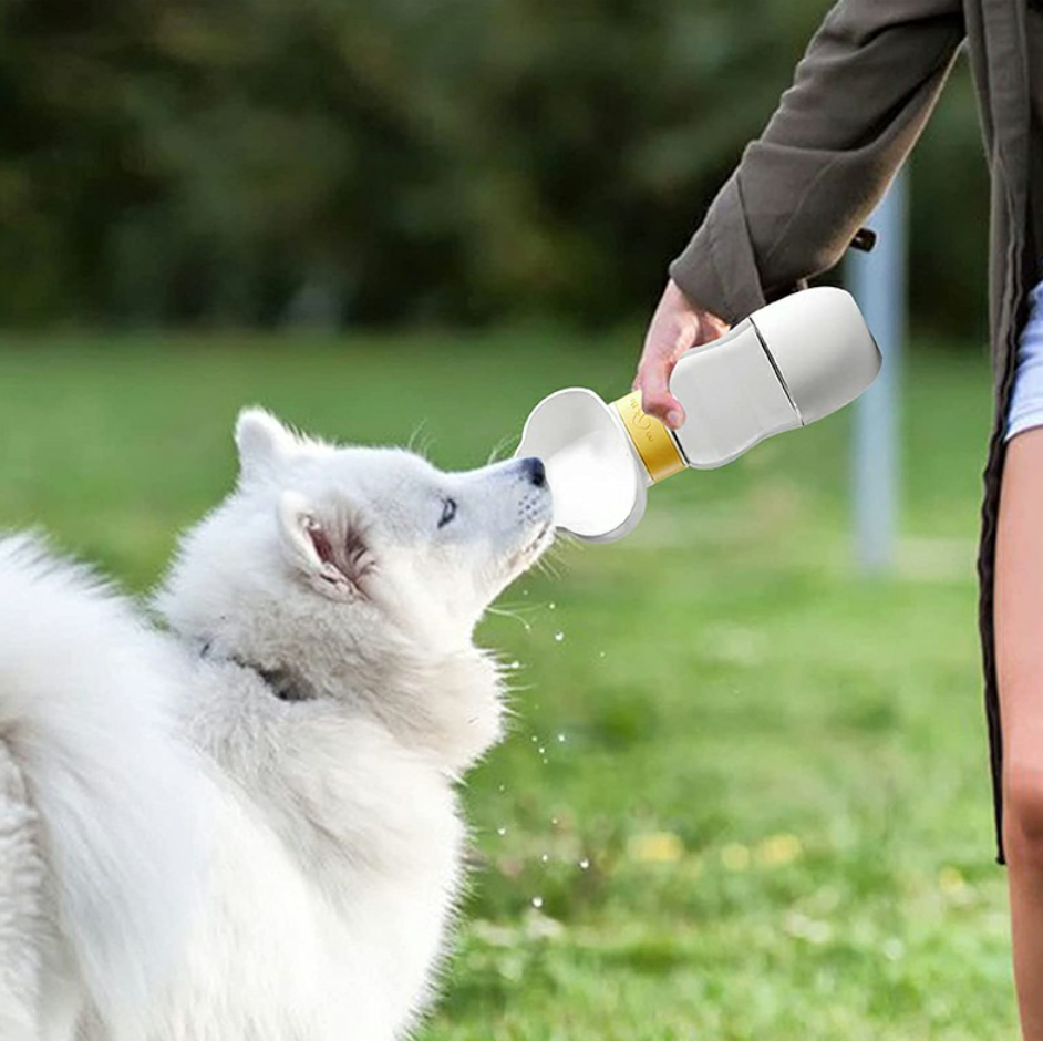 550ML Leak Proof Dog Cat Drink Bottle with 200ml Dog Food Cup - White, perfect for on-the-go hydration for pets.